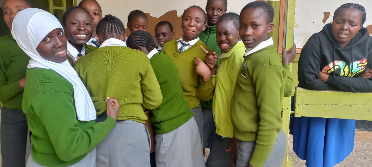 Smiling students during Period Pride Kenya educational session